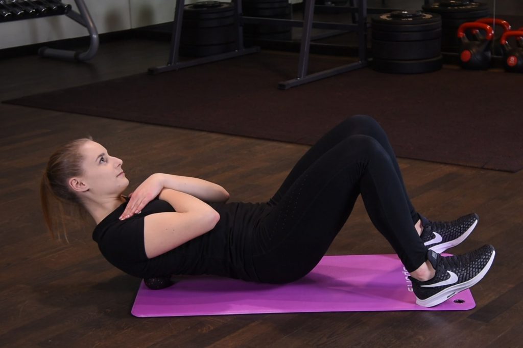 Rolowanie kręgosłupa piersiowego piłeczką duoball