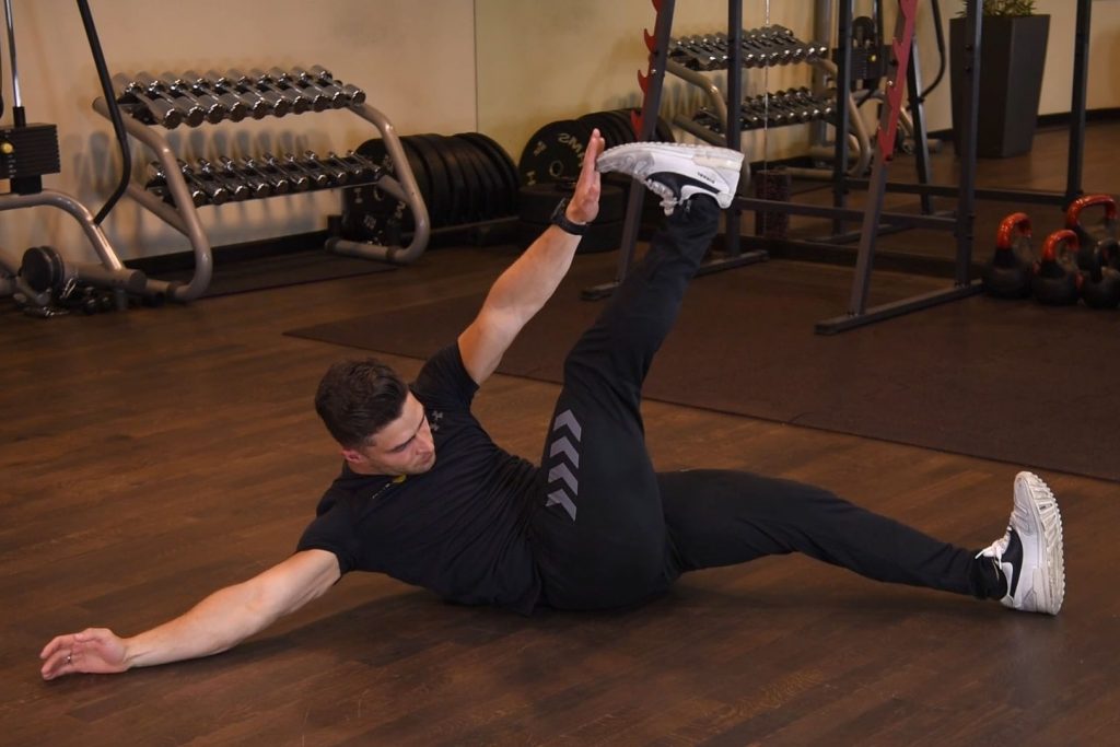 Cross toe touch - just be fit