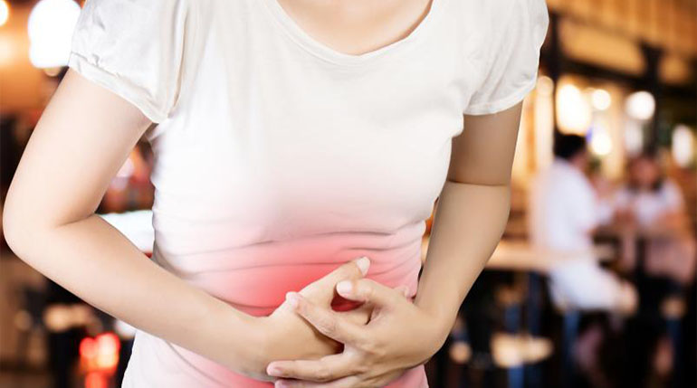 wzdęty brzuch objawy